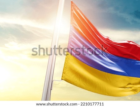 Armenia national flag cloth fabric waving on the sky with beautiful sunlight - Image