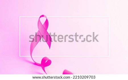 Cancer awareness. Health care symbol pink ribbon on white background. Breast woman support concept. World cancer day Royalty-Free Stock Photo #2210209703