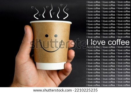 a paper cup with a smiley face