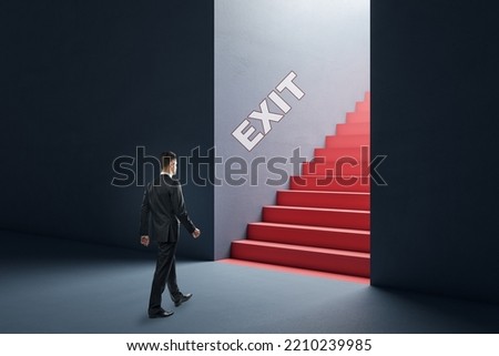 Business decision and career development concept with walking man side view to red stairway with exit sign above it