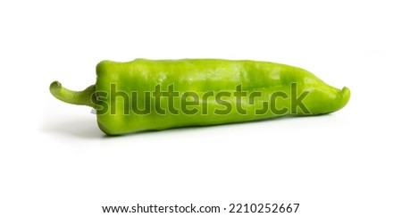 Green pepper isolated on white background. Still life picture taken in studio with softbox.