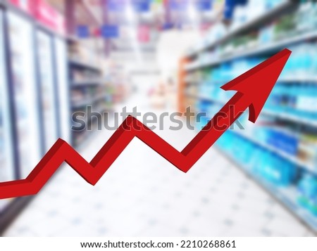 Red growing up large arrow on abstract blur image of supermarket background. Defocused shelves. food. Grocery shopping. Store. Retail industry. Inflation. Economic crisis concept. Aisle. Recession.