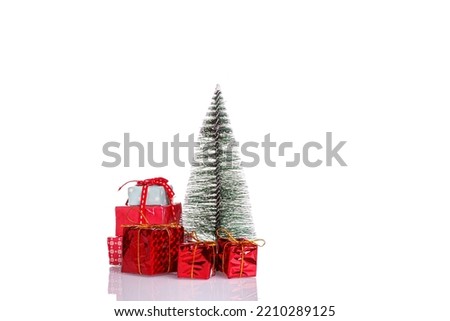 snowman, Christmas tree, gifts, sled on a white background close-up