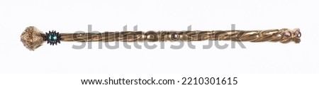 golden wand isolated on white background Royalty-Free Stock Photo #2210301615