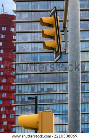 Traffic light in a modern finance and business district