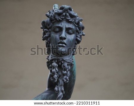 perseus cellini bronze statue detail in florence Royalty-Free Stock Photo #2210311911