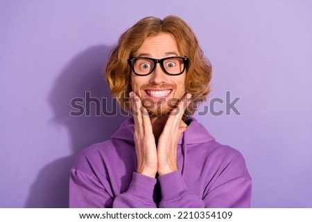 Photo of cute wavy red hairstyle guy wear eyewear purple hoodie isolated on pastel violet color background