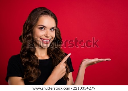 Photo of youth lovely lady indicate fingers advertise promo banner decision isolated over red color background