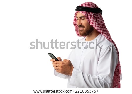 Young Arab businessman using smartphone isolated on white background