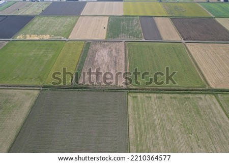 Autumn farmland in Japanese countryside shot from the sky by drone