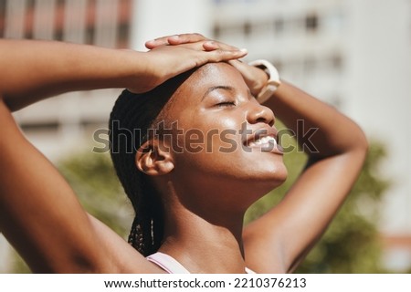 Face, breathing air and and black woman in the sun to relax while on a wellness exercise walk in nature. Happiness, freedom and calm african girl taking a break in outside park during healthy workout Royalty-Free Stock Photo #2210376213