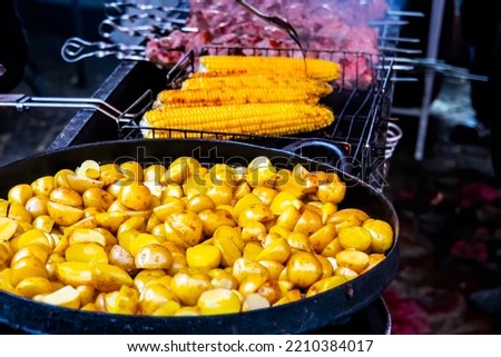 Grilled potatoes.The concept of cooking in nature