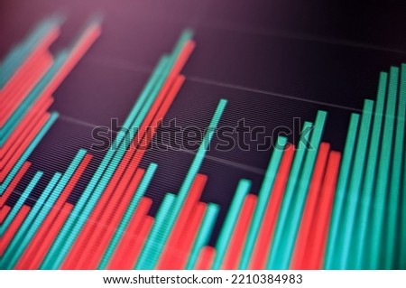 Stock market financial price chart with red and green graph displayed on a pixelated monitor with a dark background
