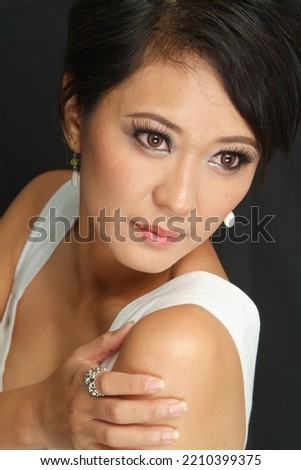 Lifestyle, beauty and fashion, people emotions concept. young asian female with pleased expression