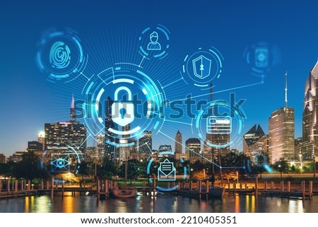 City view of Downtown skyscrapers of Chicago skyline panorama over Lake Michigan, harbor area, night time, Illinois, USA. The concept of cyber security to protect companies confidential information