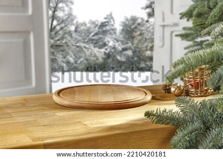 Wooden desk of free space and winter landscape. 