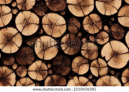 a close up of a pile of wood, a lot of logs with some sort of brown color. seamless texture