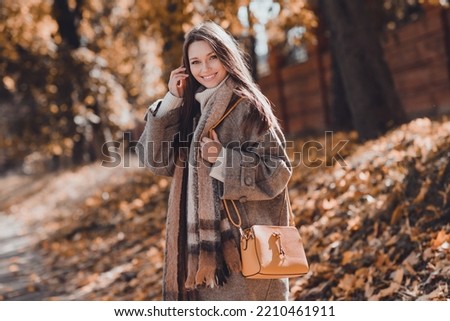 Photo of pretty cute lady businesswoman going work enjoy morning autumn weather dressed warm modern outfit overcoat good mood outdoors Royalty-Free Stock Photo #2210461911