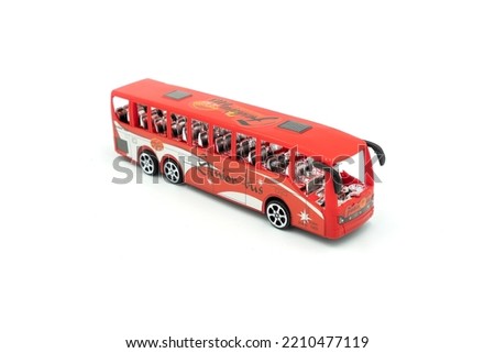 Plastic bus toy isolated on white background. High quality photo