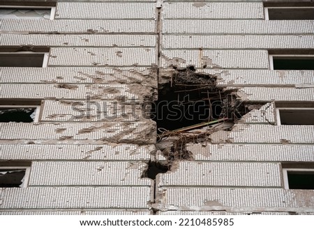 destroyed and burned houses in the city Russia Ukraine war Royalty-Free Stock Photo #2210485985