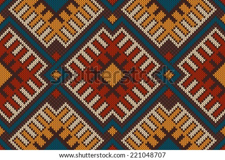 Tribal Aztec seamless pattern on the wool knitted texture