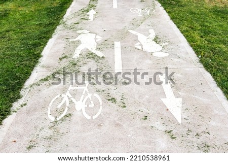 shared walking and bicycle signage on footpath