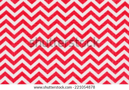 White fabric with a red chevron pattern