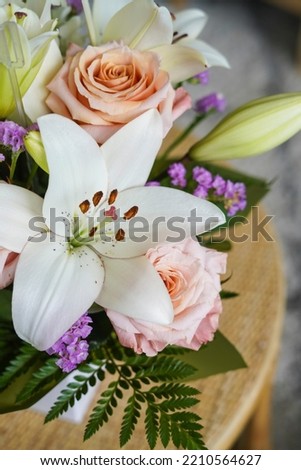 Flower bouquet, rose and lily flowers, bright colourful floral arrangement. Flower bouquet. Pink and white flowers. floral arrangement.