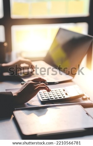 Portrait of a woman working on a tablet computer in a modern office. Make an account analysis report. real estate investment information financial and tax system concepts Royalty-Free Stock Photo #2210566781