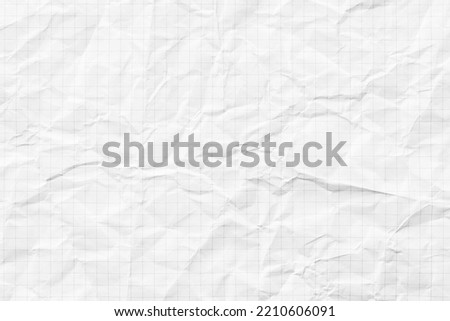 white crumpled paper texture background, checkered notebook sheet Royalty-Free Stock Photo #2210606091