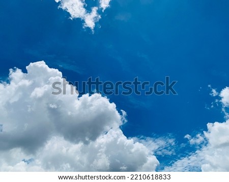 A large cumulus clouds topped like a beautiful cauliflower in Thailand.no focus Royalty-Free Stock Photo #2210618833