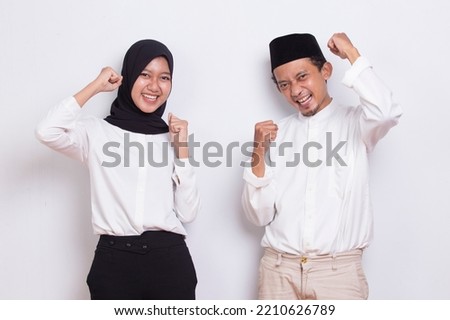 young asian muslim couple with ok sign gesture tumb up isolated on white background