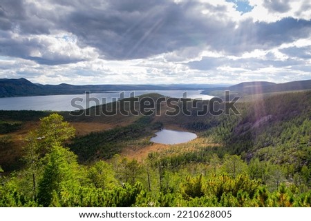 Far East of Russia, Mgadan region, Susuman district, Malyk lake.
A beautiful mountain lake named Malyk in the north of the Far East is five hundred kilometers from the city of Magadan.. Royalty-Free Stock Photo #2210628005