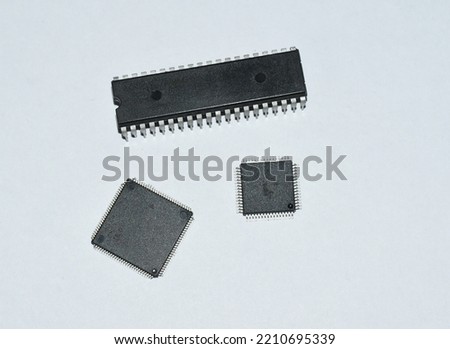 Electronic components, isolated on white background, microprocessor and transistor, 8 bit Technology, 4 nm
