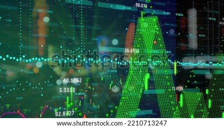 Composite image of financial data processing against night city traffic. Global finance and technology concept