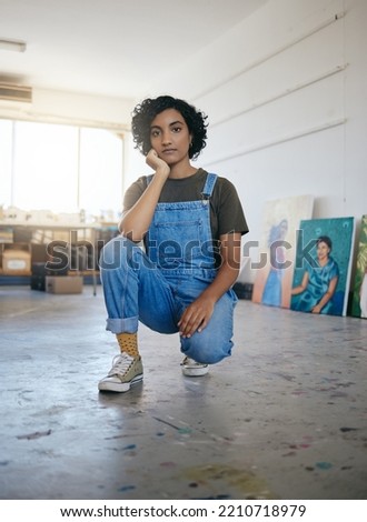 Artist portrait in studio, workshop with gallery of canvas artwork and young confident Indian woman. Professional creative graphic painter, cool art exhibition and designer oil painting lifestyle