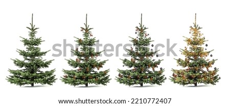 Released decorated Christmas trees against white background