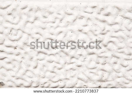 Rough texture. The background of the rough surface. solid wall background