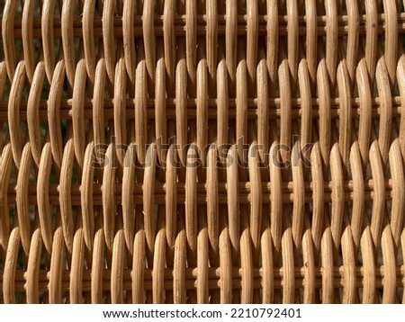 a beige braided rattan pattern