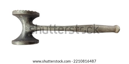 Metal meat tenderizer. Meat hammer. Close up of meat mallet. Old metal kitchen utensil. Hammer for beating the meat. Isolated on white background. Royalty-Free Stock Photo #2210816487