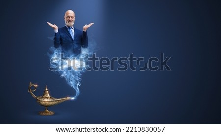 Businessman genie coming out from the lamp and smiling, blank copy space Royalty-Free Stock Photo #2210830057