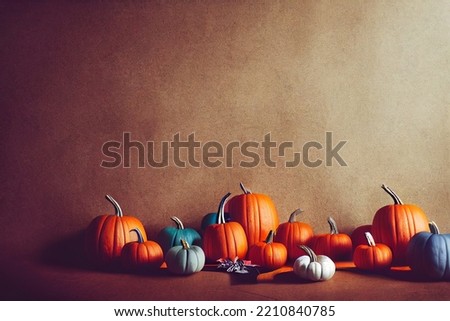 Different pumpkins lying on the floor, Halloween holiday. Pumpkins for lanterns in the background of the wall
