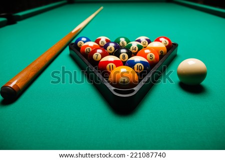 Billiard balls in a pool table. Royalty-Free Stock Photo #221087740