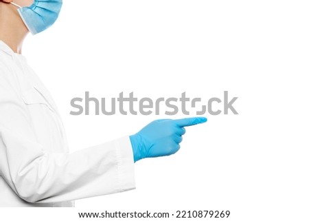 Doctor in uniform points to the side