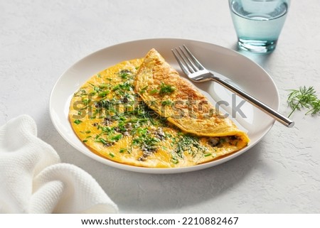 omelette with blue cheese herbs spring onion. healthy keto diet low carb breakfast Royalty-Free Stock Photo #2210882467