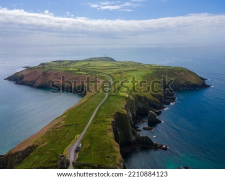 Ireland, Kinsale. The Old Head Of Kinsale areal shot, daylight. At 18 km, from here on 7 May 1915, the British ship Lusitania was destroyed by a German U-boat. Around 1200 people died. 