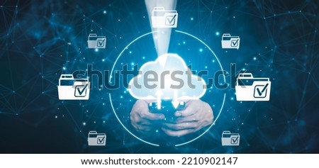 Businessman hold Smartphone with data information on the Cloud Computing Technology Internet Storage Network,  big data Through internet technology, Cloud sharing download and upload