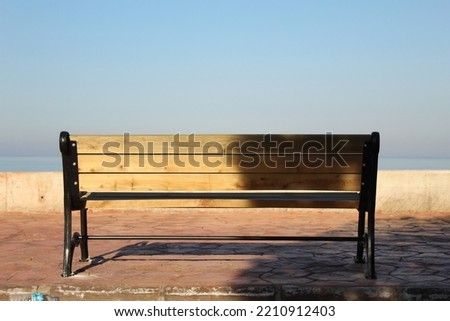 An alone bench for lonely people. High quality photo