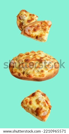 Cheese pizza isolated in green or mint background with clipping path, no shadow, a set of whole, slices or pieces of pizza
