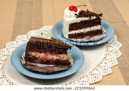 Image of chocolate cake in ceramic dish on   fabric